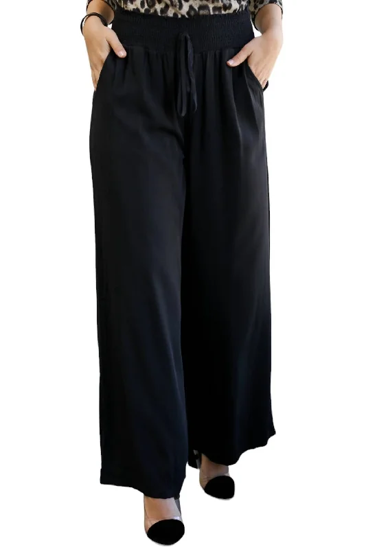 Lightweight hiking pants for women in outdoor activitiesCue The Glam Pants In Black
