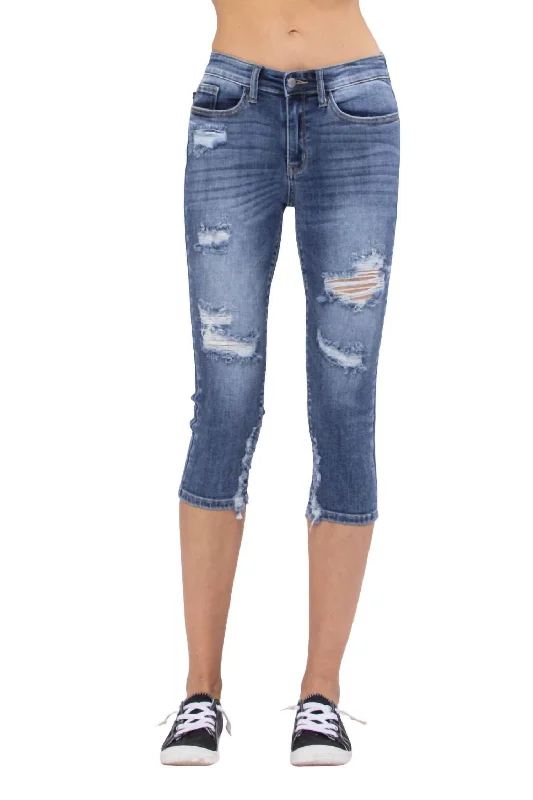 Culottes with wide leg and ruffled hem for women in a feminine and stylish styleHeavy Sanded Mid-Rise Destroyed Skinny Capri In Medium Wash