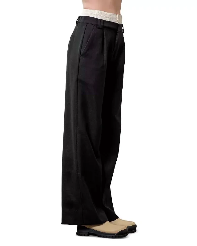 Embroidered denim pants for women in a unique lookLayered Waist Band Tailored Pleat Pants In Black Embroidered denim pants for women in a unique lookLayered Waist Band Tailored Pleat Pants In Black