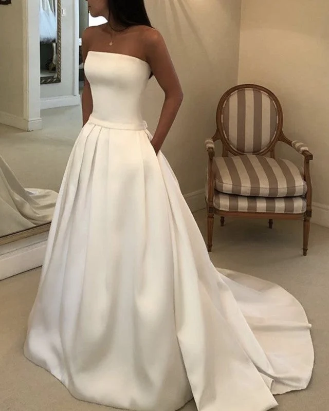 "Simple wedding dresses for women who prefer understated elegance"Sleeveles Satin Wedding Dress With Pockets "Simple wedding dresses for women who prefer understated elegance"Sleeveles Satin Wedding Dress With Pockets