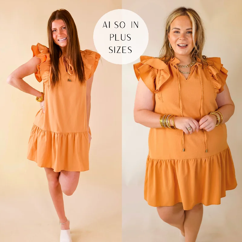 "Denim dresses for women for a casual and cool style"Powerful Love Ruffle Cap Sleeve Dress with Keyhole and Tie Neckline in Sunset Orange "Denim dresses for women for a casual and cool style"Powerful Love Ruffle Cap Sleeve Dress with Keyhole and Tie Neckline in Sunset Orange