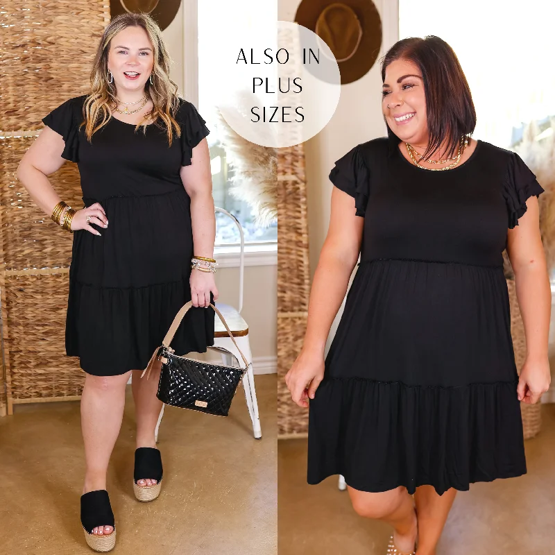 "Pleated dresses for women with a graceful movement"Don't Mind If I Do Ruffle Tiered Dress with Ruffle Cap Sleeves in Black "Pleated dresses for women with a graceful movement"Don't Mind If I Do Ruffle Tiered Dress with Ruffle Cap Sleeves in Black