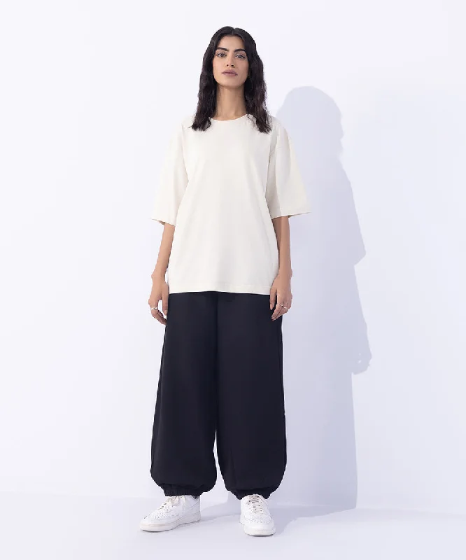Women's T - shirt with a metallic - colored buttonLoose Fit T-Shirt